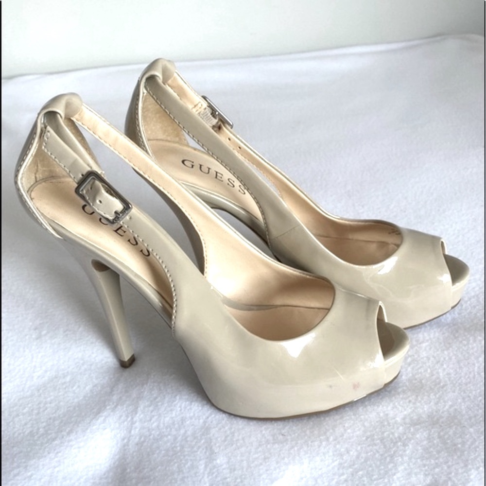 Guess women’s open toe heels.
